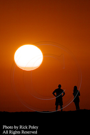 Couple on Beach at Sunset