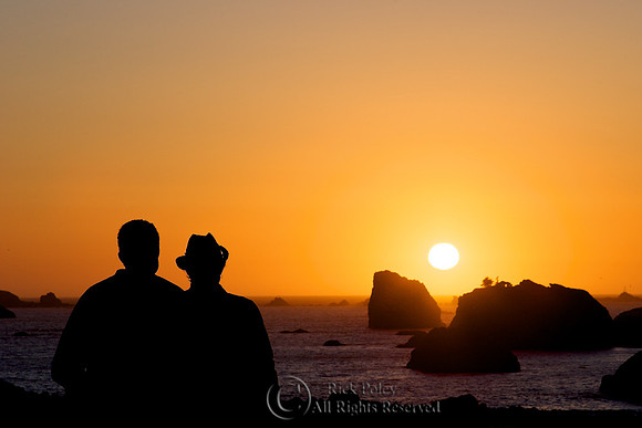 Couple at sunset at Crescent City, CA
