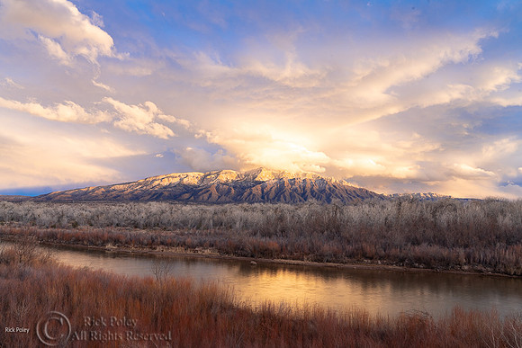 Sandia Mountain with snow & clouds, NM