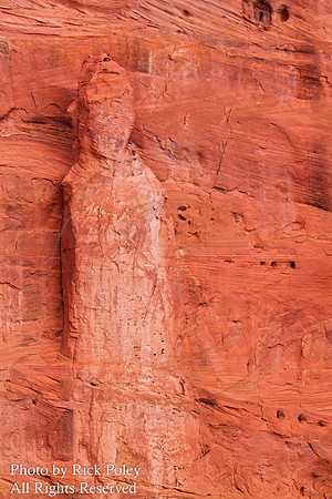 rosional Hoodoo Stone Figure emerges from Jemez Red Rocks