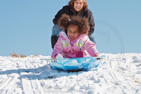 Young Girl Sledding